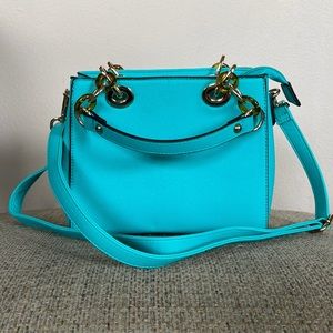 Vibrant turquoise vegan leather satchel crossbody bag